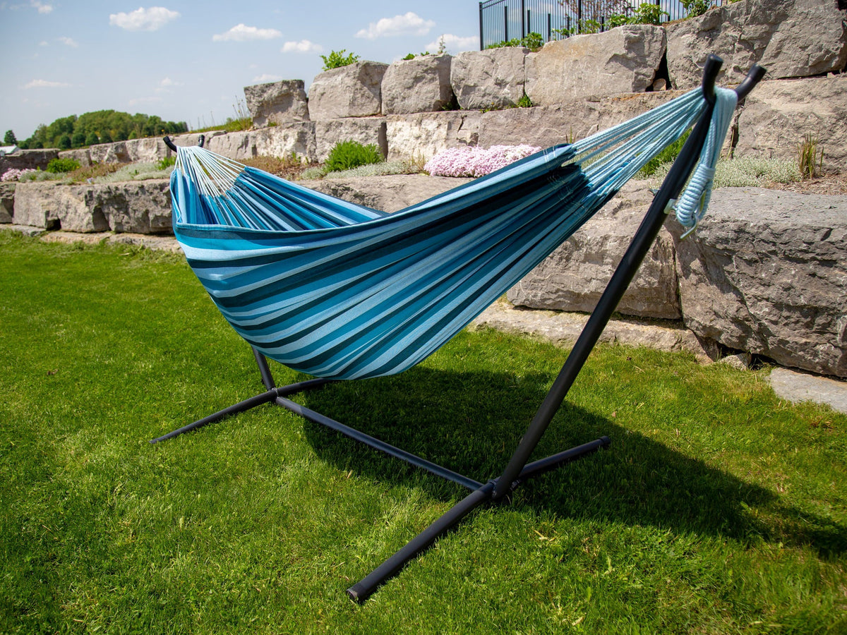 The Hamptons Collection 110” Blue Sizetriped Brazilian Sizetyle Hammock with a Sizeteel Hammock Sizetand